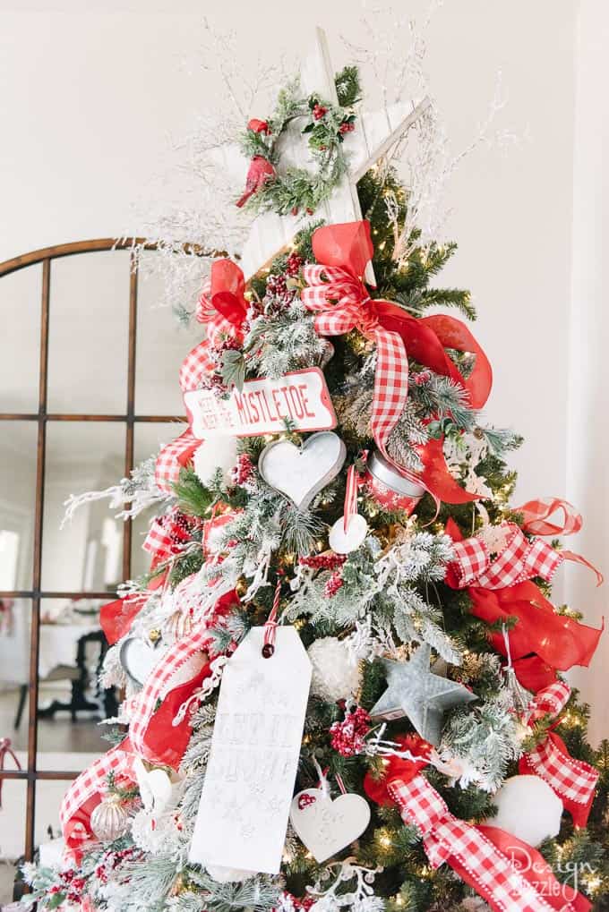 Do you want to have the most beautiful tree on the block? This Christmas tree decorating hack is incredibly simple but will make all the difference in how beautiful your tree looks this year! | Design Dazzle