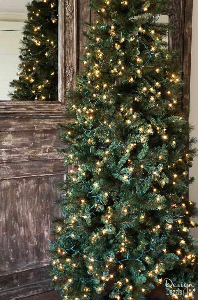 Do you want to have the most beautiful tree on the block? This Christmas tree decorating hack is incredibly simple but will make all the difference in how beautiful your tree looks this year! | Design Dazzle