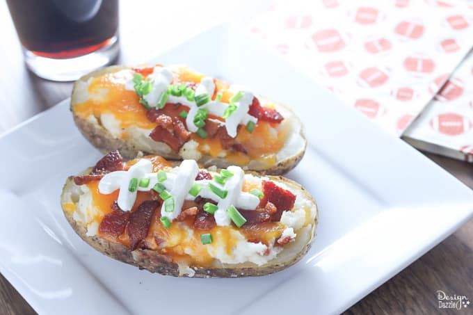 These Game Day Loaded Twice Baked Potatoes are incredibly delicious and surprisingly simple to make! Your guests and party-goers will absolutely love them! | Design Dazzle