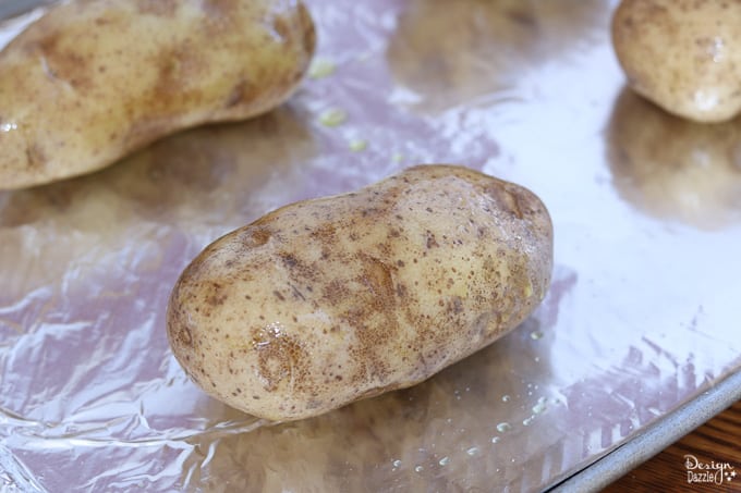 These Game Day Loaded Twice Baked Potatoes are incredibly delicious and surprisingly simple to make! Your guests and party-goers will absolutely love them! | Design Dazzle