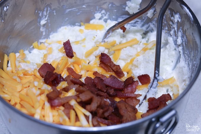 These Game Day Loaded Twice Baked Potatoes are incredibly delicious and surprisingly simple to make! Your guests and party-goers will absolutely love them! | Design Dazzle