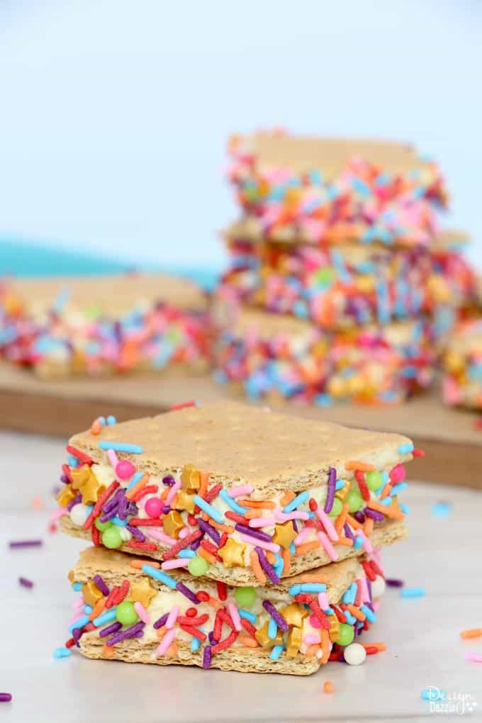 These cute stuffed graham crackers are a great afternoon snacks for the kiddos! Absolutely easy to make! Have fun preparing them, especially when it comes to the sprinkles! - Design Dazzle