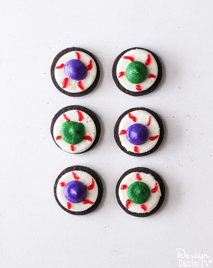 What better way to celebrate Halloween than by making Edible Halloween Treats for Kids WITH your kids? Find the instructions below! | Design Dazzle Edible halloween treats for kids 5