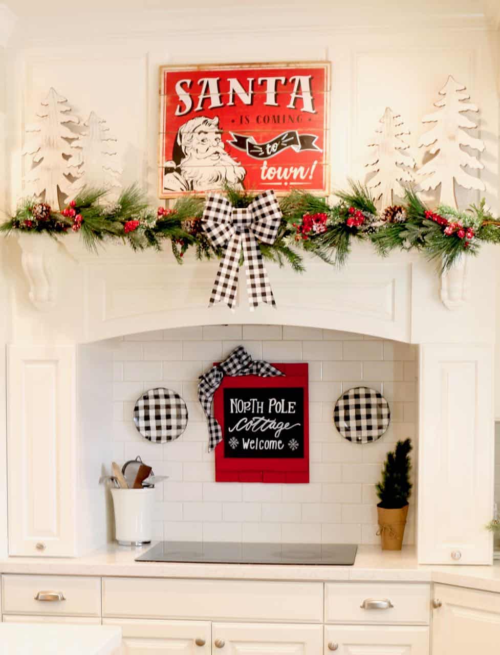 How to hang decor on backsplash tile with no holes. Tips on decorating your kitchen for Christmas!