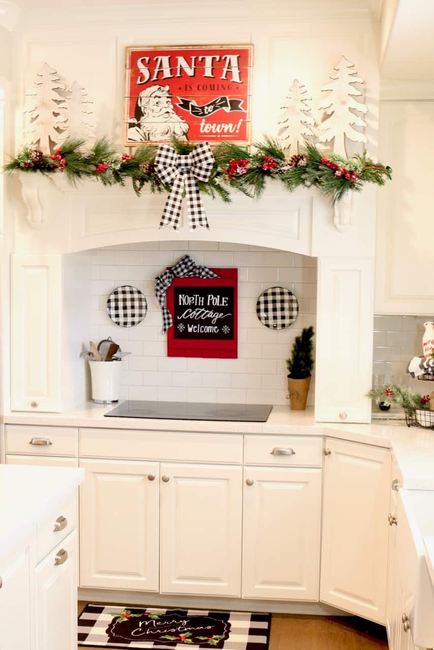 How to hang decor on backsplash tile with no holes. Tips on decorating your kitchen for Christmas!