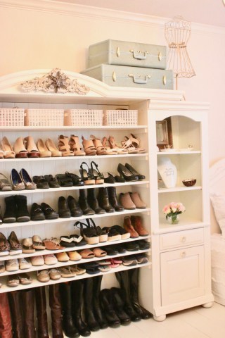 Repurposed entertainment center to shoe storage cabinet