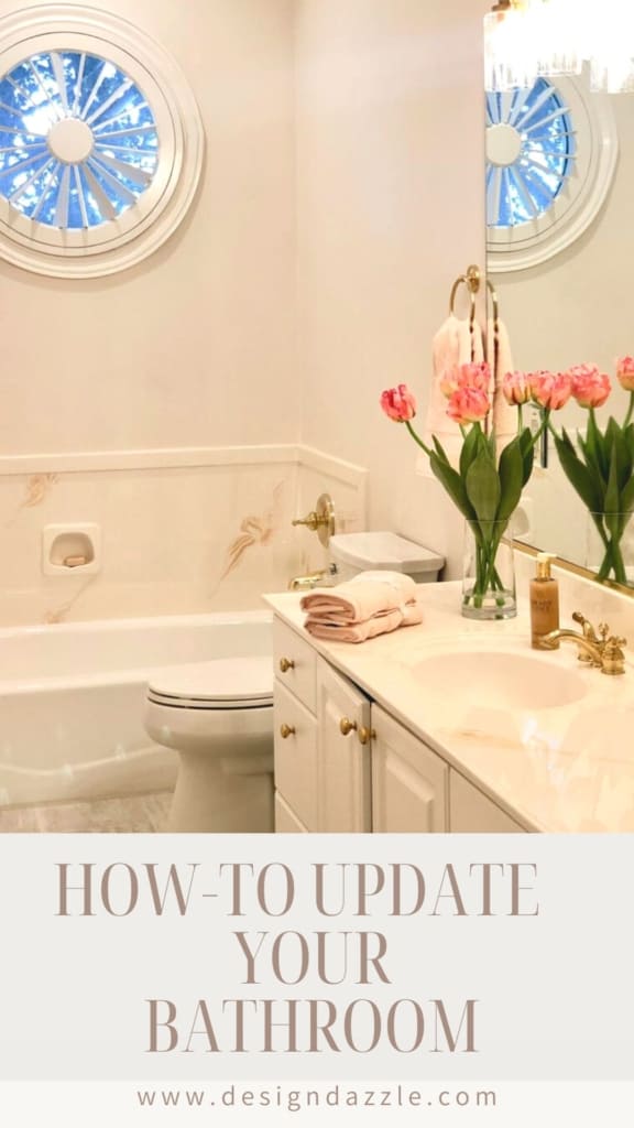 The biggest cost of this bathroom update was the tile flooring and the light fixture. Home decor was added to make the room pretty! This is what the bathroom looked like before. It’s a pretty simple bathroom with a wonderful round window! Click here to see the fresh bathroom update.