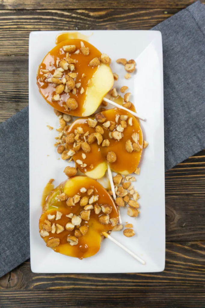 sliced caramel apple pops with nuts