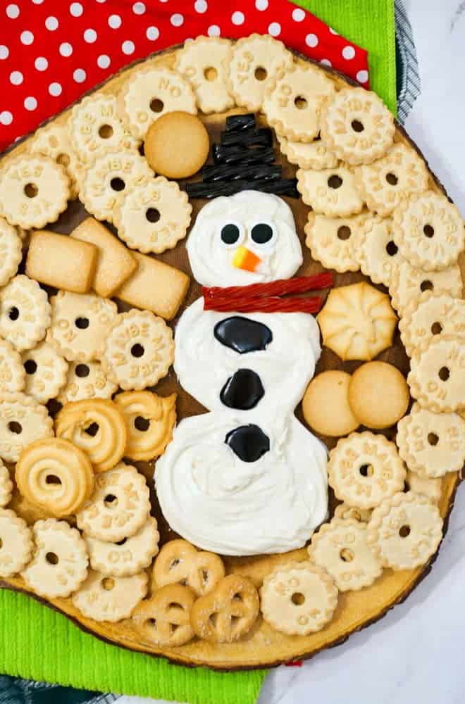 Serve Up Fun and Sweet Flavors With a Snowman Frosting Board