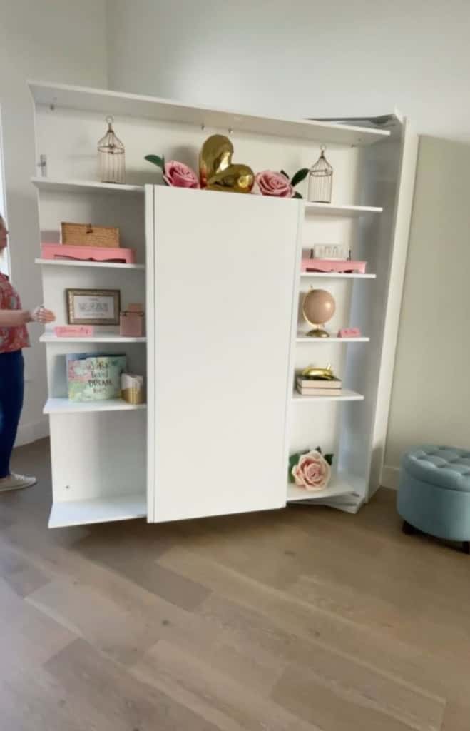 Perfect for small spaces, this Murphy bed bookcase offers dual functionality without sacrificing style. Rotate and reveal a bed whenever you need it! 